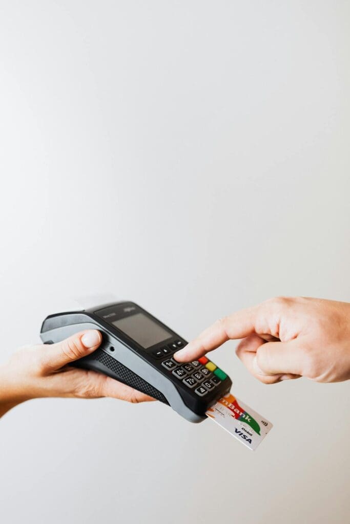 Credit card transaction showing merchant services for small businesses at checkout